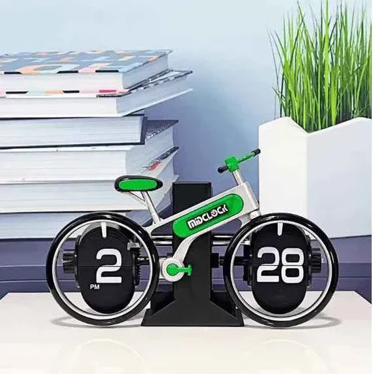 ساعة قلب على شكل دراجة ©